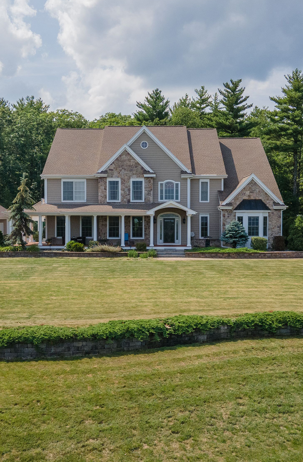 Berlin home shown after completed roofing project from our roofing experts