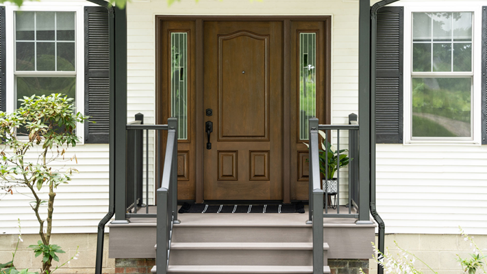 Stylish and energy-efficient front entry door installed by High Point Roofing and Remodeling, highlighting its seamless design and superior insulation capabilities.