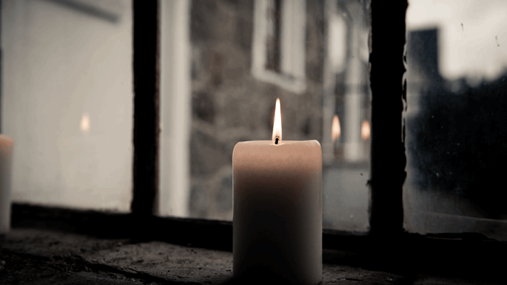 Photo of a candle located just outside a home in New Jersey