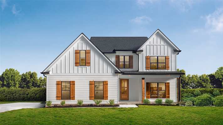 A brand new NJ home with white fiber cement siding.