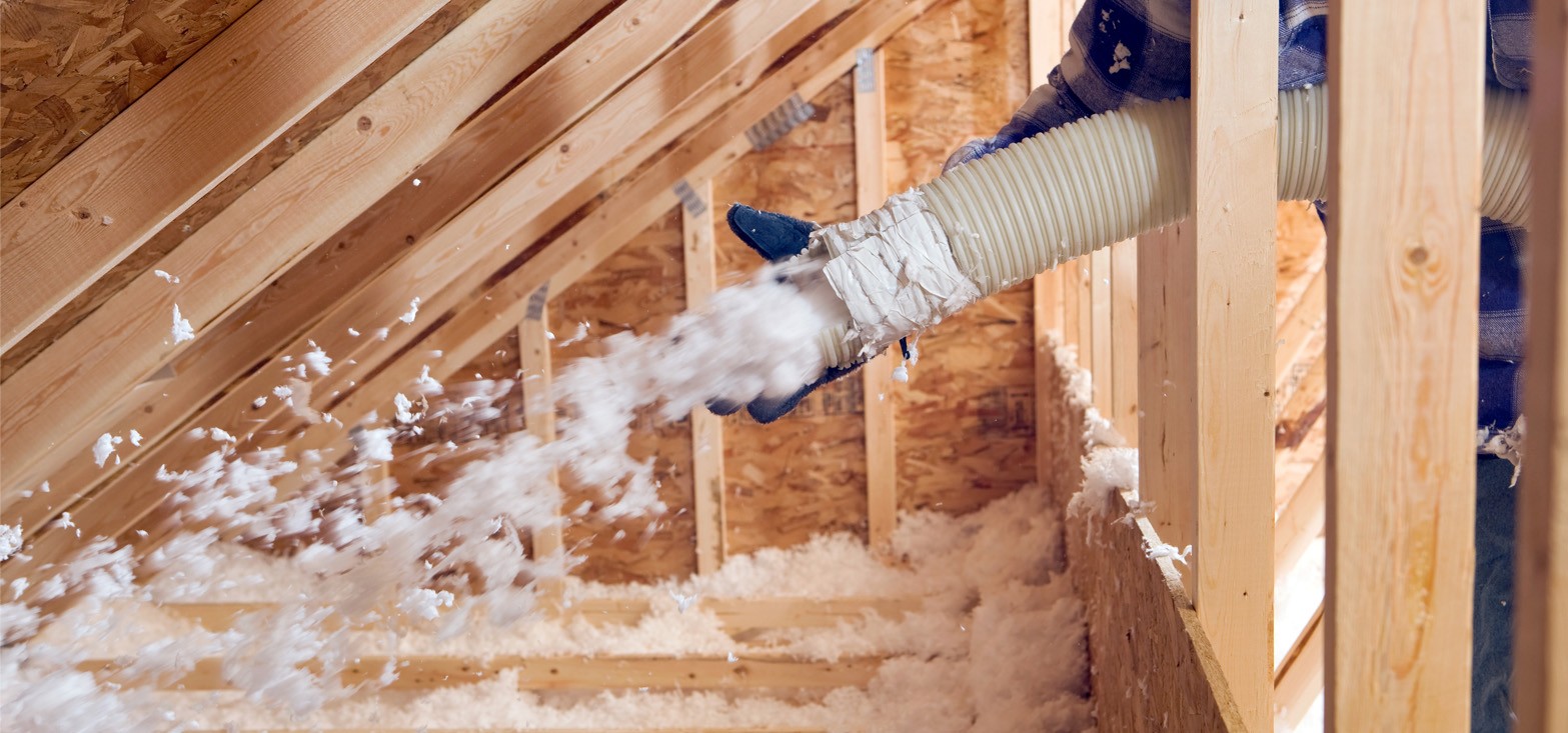 attic insulation installation in progress in medford
